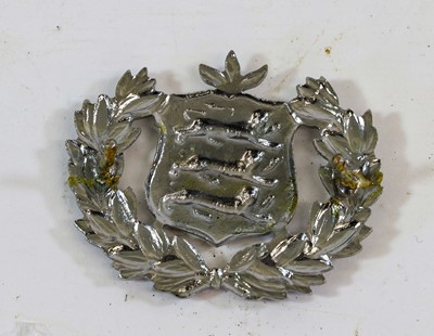 Lot 88 - A Guernsey Police Cap Badge, in chrome, with...