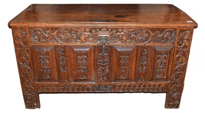 Lot 774 - A Carved and Panelled Joined Oak Chest, the...