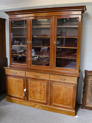 Lot 1200 - An Edwardian inlaid mahogany bookcase cabinet,...