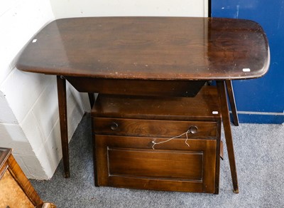 Lot 1368 - An Ercol dark elm side table fitted with a...