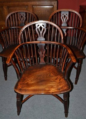 Lot 1128 - Three 19th Century Yew and Elm Windsor Armchairs, with double row spindles and pierced splat...