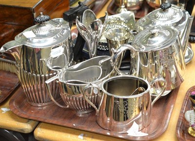 Lot 307 - Tray of assorted silver plate including three piece gadrooned tea set, teapot and sugar basin, oval