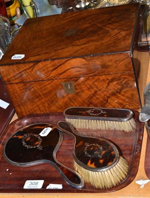 Lot 308 - Tortoiseshell and inlaid silver three piece brush set and a walnut hinged jewellery case