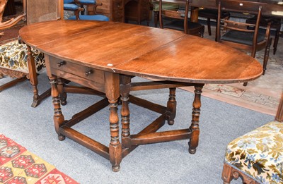 Lot 1401 - A Titchmarsh & Goodwin style gateleg table,...