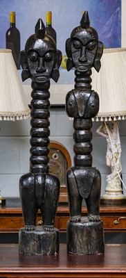 Lot 393 - Two African carved wooden tribal figural...