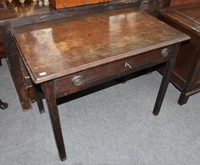 Lot 1284 - A George III mahogany side table fitted with a...