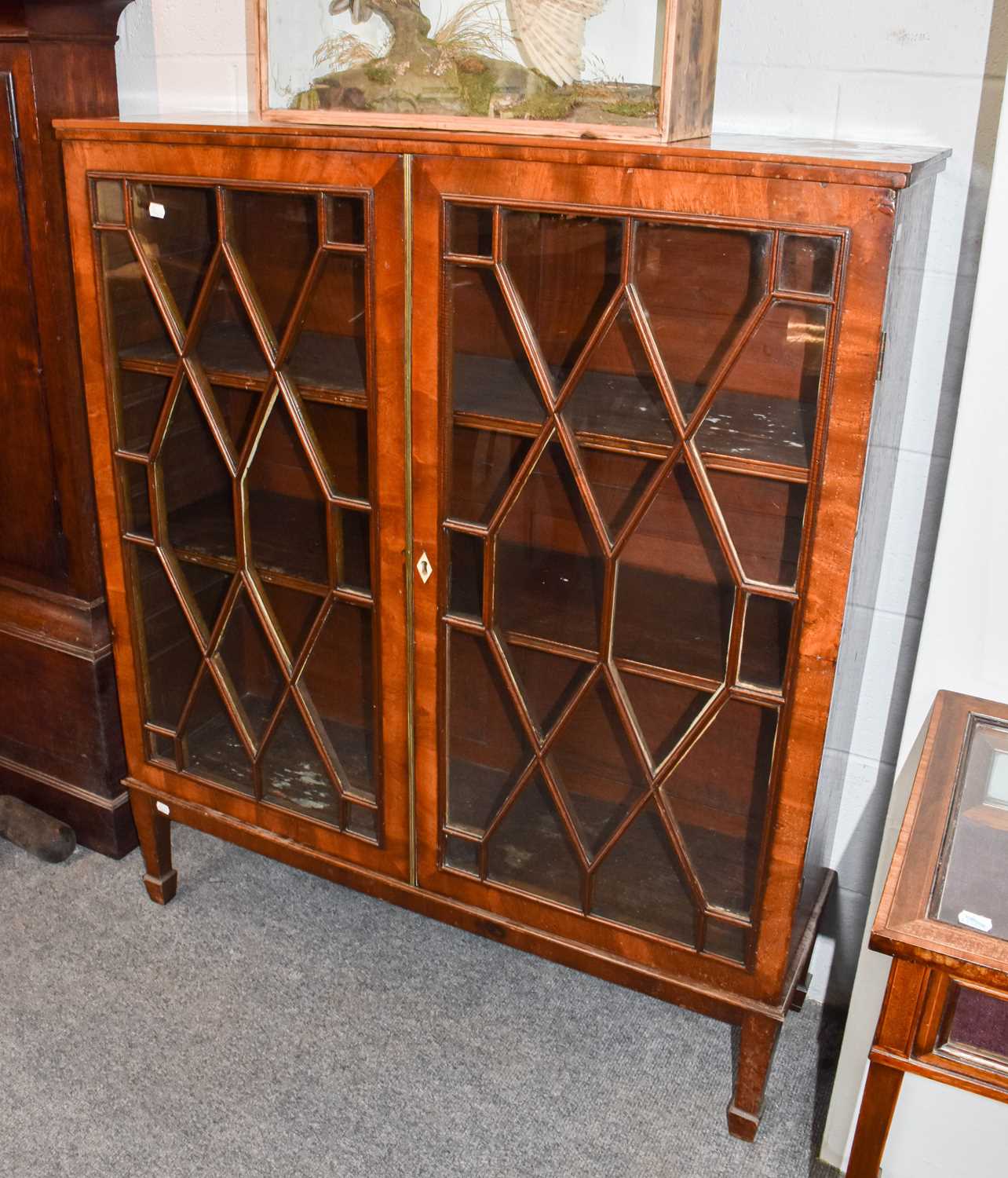 Lot 1275 - A 19th century glazed mahogany display cabinet,...