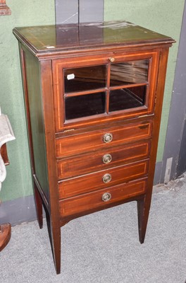 Lot 1338 - An Edwardian inlaid mahogany music cabinet,...