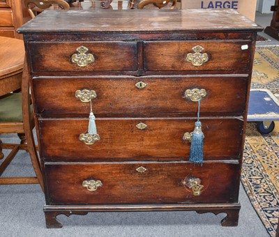 Lot 1237 - An 18th century oak four-height straight front...