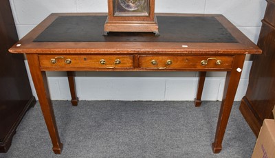 Lot 1199 - An early 20th century leather inset mahogany...