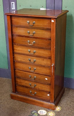 Lot 1189 - An Edwardian nine drawer Wellington chest,...