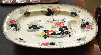 Lot 317 - A Victorian pottery meat well dish