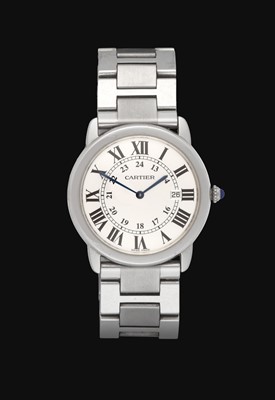Lot 2200 - Cartier: A Stainless Steel Calendar Wristwatch