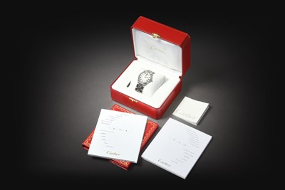 Lot 2200 - Cartier: A Stainless Steel Calendar Wristwatch