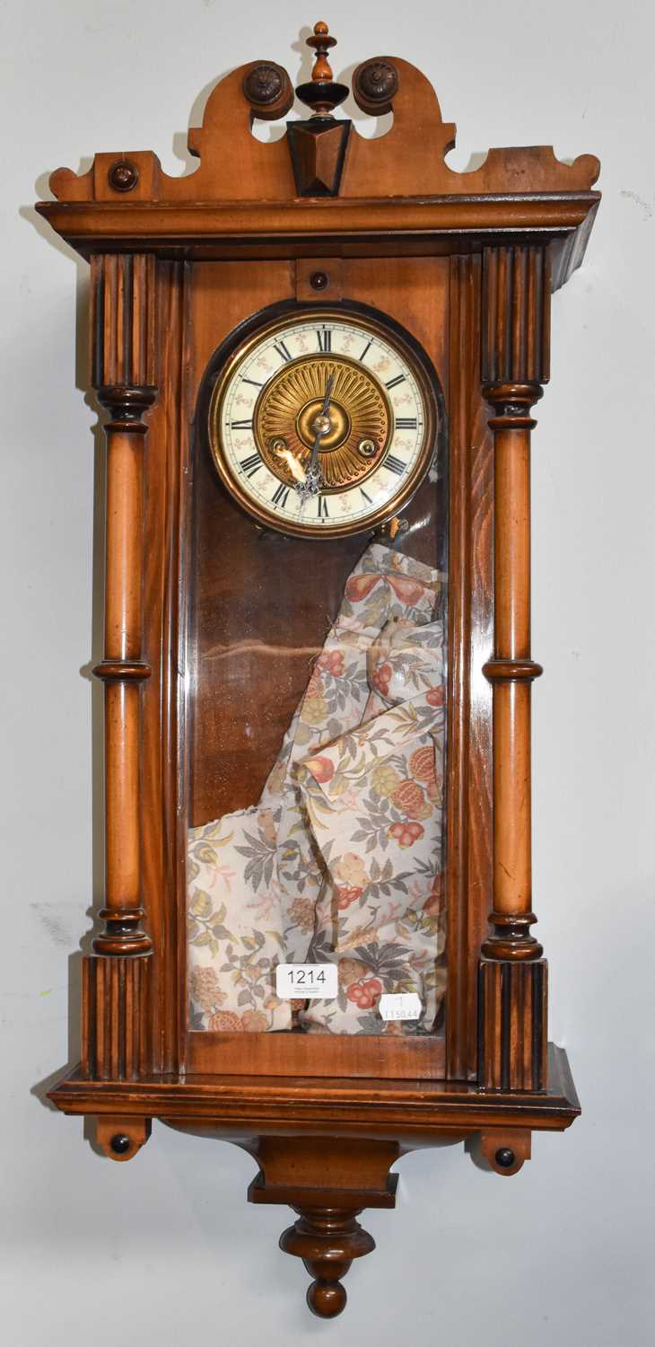 Lot 1214 - A Vienna type striking wall clock, twin train...