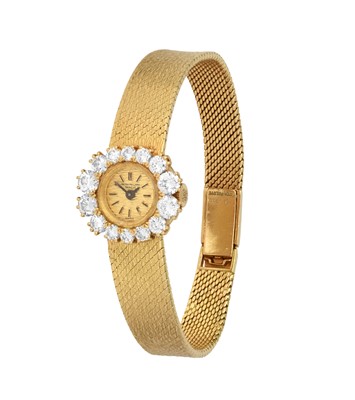 Lot 2233 - Patek Philippe: A Lady's 18 Carat Gold Diamond Set Wristwatch