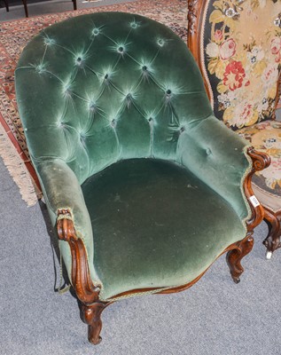 Lot 1254 - A Victorian button back tub chair on scroll...