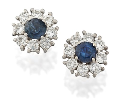 Lot 2307 - A Pair of Sapphire and Diamond Cluster Earrings