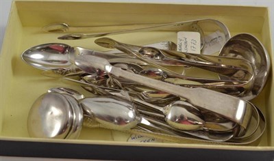 Lot 339 - A collection of silver comprising eight pairs of sugar tongs, a sauce ladle, eleven teaspoons and a