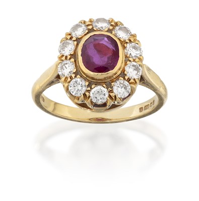 Lot 2325 - An 18 Carat Gold Ruby and Diamond Cluster Ring