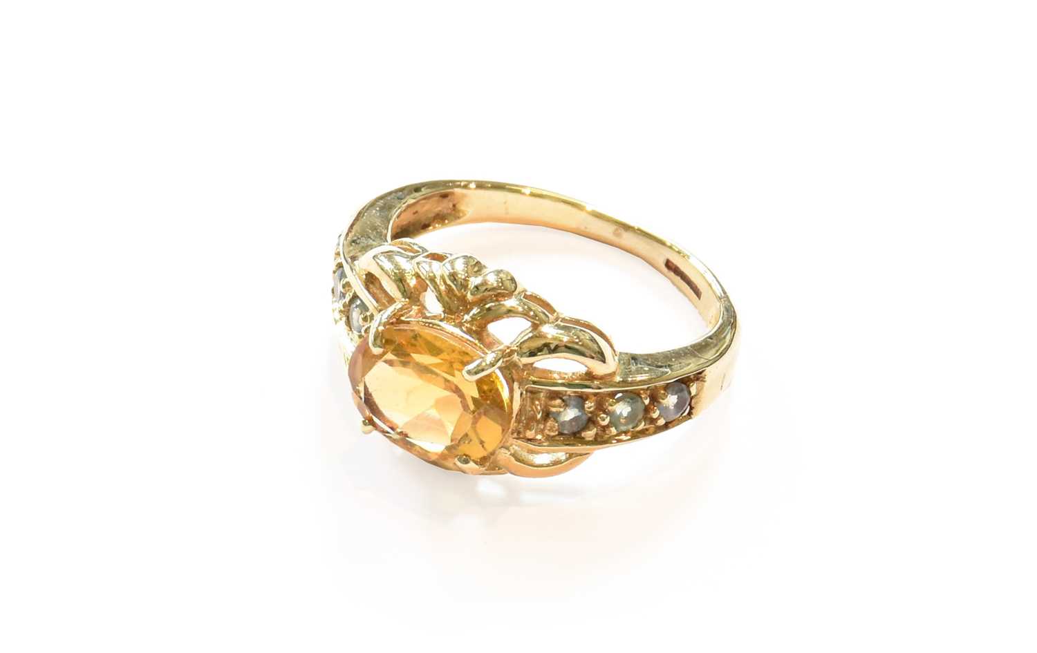 Lot 360 - A 9 carat gold citrine ring, finger size K