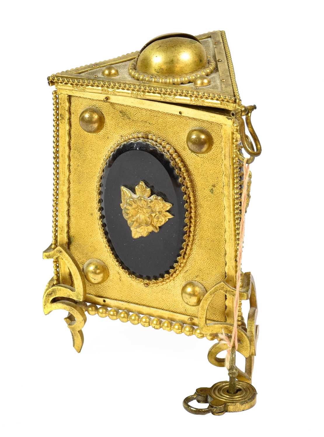 Lot 79 - A Brass Money-Box, of triangular section, on