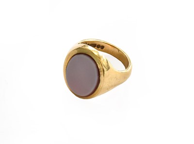 Lot 217 - A 9 carat gold hardstone signet ring, finger...