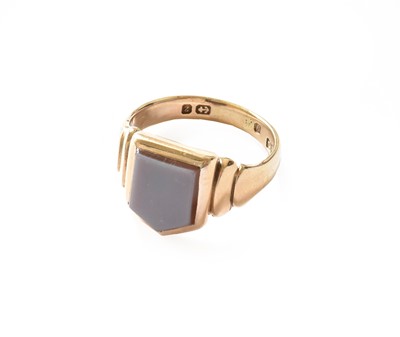 Lot 174 - A 9 carat gold hardstone signet ring, finger...