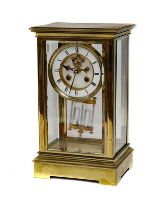 Lot 327 - A brass four glass striking mounted mantel clock