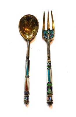 Lot 180 - A Russian Silver-Gilt and Enamel Spoon and...