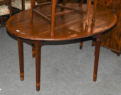 Lot 1240 - A 19th mahogany oval drop leaf dining table...