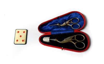 Lot 335 - Two pairs of stork sewing scissors with a...