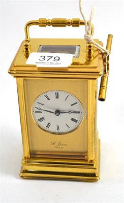 Lot 379 - A modern brass carriage clock, inscribed St James, London