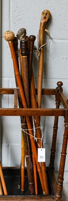 Lot 303 - Nine various walking canes, bamboo, cane and...