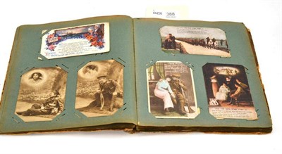 Lot 388 - A postcard album circa 1914, various postcards, mostly from a soldier in Japan in the Royal...