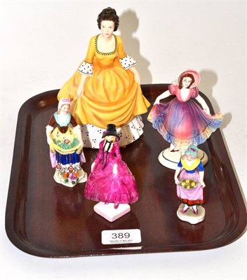 Lot 389 - A Royal Doulton figure 'Pantalette', Royal Doulton figure 'Coralie' and three Continental figures