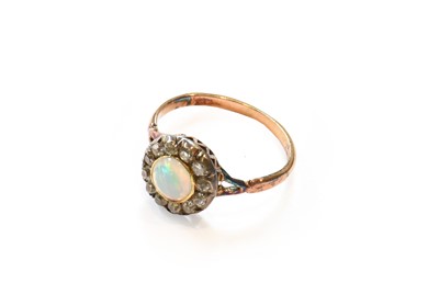 Lot 373 - An opal and diamond cluster ring, unmarked,...