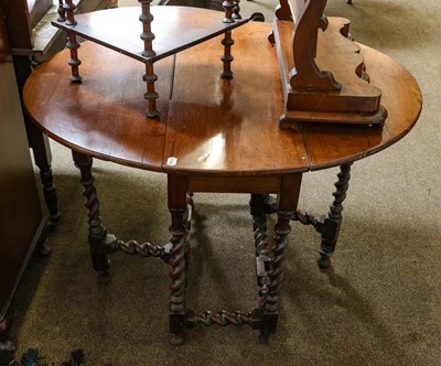 Lot 1179 - A mahogany gateleg table, with elliptical...