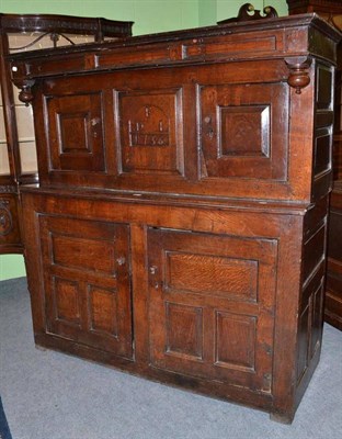 Lot 1137 - An 18th Century Joined Oak Welsh Deudarn, with inverted finials above three fielded panels with...