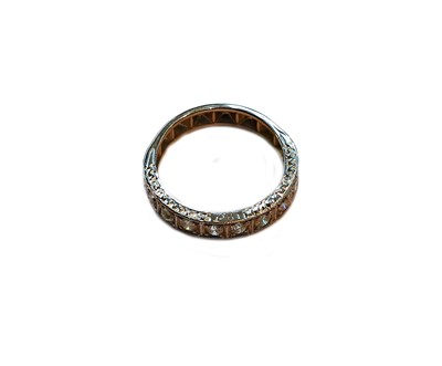 Lot 421 - A diamond half hoop ring, stamped '18CT',...