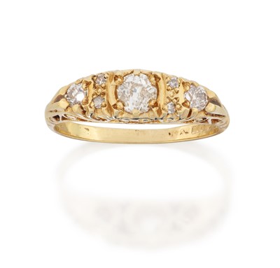 Lot 2064 - An 18 Carat Gold Diamond Three Stone Ring