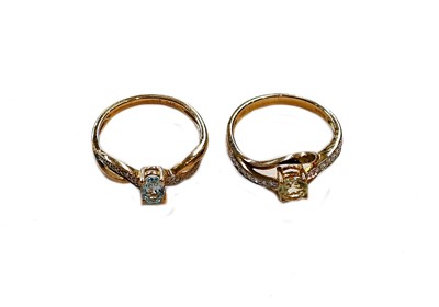 Lot 411 - A 9 carat gold aquamarine and diamond ring,...