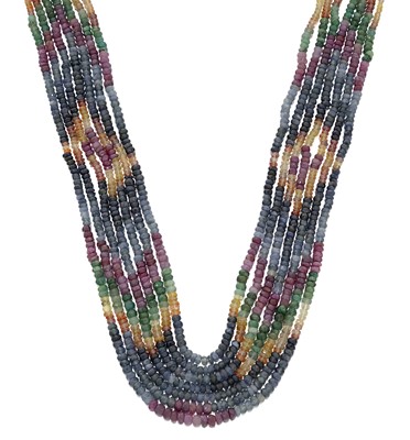 Lot 2087 - A Multi-Coloured Gemstone Seven Strand Bead Necklace