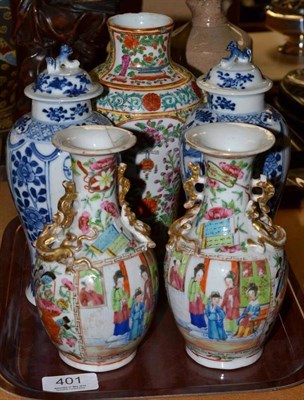 Lot 401 - A pair of blue and white ginger jars an covers, pair of famille rose vases and one other