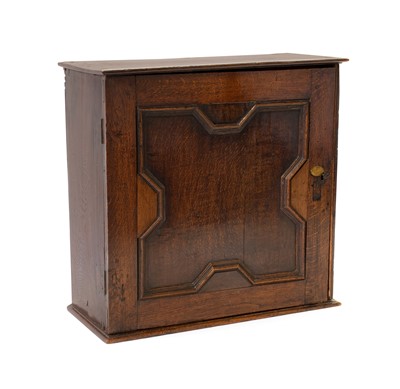 Lot 209 - A Late 17th Century Oak Spice Cupboard, the...