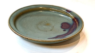 Lot 467 - A Chinese Jun ware shallow bowl, 19.75cm diameter