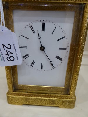 Lot 249 - A Brass Engraved Striking Carriage Clock,...