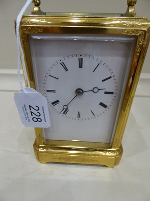 Lot 228 - A Brass Engraved Striking Carriage Clock,...