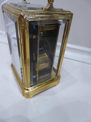 Lot 228 - A Brass Engraved Striking Carriage Clock,...