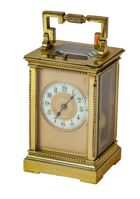 Lot 471 - Brass striking and repeating carriage clock,...